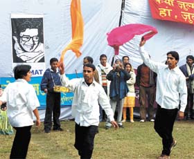 Artistes performing in a street play on the occasion of death anniversary of Safdar Hashmi at VP House in the Capital
