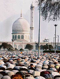 Muslims offer Id prayers at Hazratbal in Srinagar on Monday.