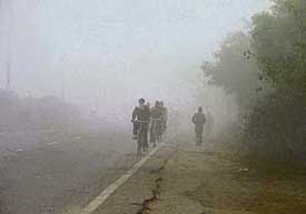 Cyclists brave the chill on a foggy Monday morning in Ludhiana