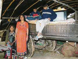 Members of a nomadic tribe at their dera at Sarinh village in Jalandhar district on Sunday.