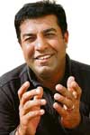 Harmeet Kahlon will rub shoulders with Tiger Woods at the Dubai Desert Classic.