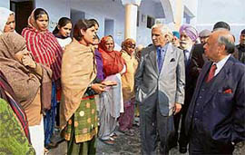 Inmates of Central Security Jail explain their problems to Chief Justice of the Punjab and Haryana High Court Vijender Kumar Jain in Amritsar on Tuesday.