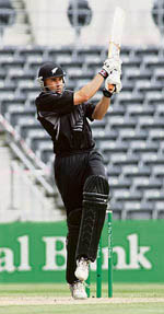 ew Zealands Peter Fulton hits a six during the third one-day match against Sri Lanka in Christchurch on Tuesday.  AFP photo
