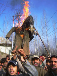 Protesters burn an effigy of US President George W. Bush against the execution of Saddam Hussein in Srinagar on Wednesday.
