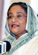 Former Prime Minister of Bangladesh Sheikh Hasina speaks during a news conference in Dhaka on Wednesday