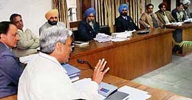 Mr Ashok Kumar Gupta, Deputy Commissioner-cum-District Electoral Officer, presides over the meeting of Returning Officers to review the arrangements for Assembly elections at Circuit House in Ludhiana