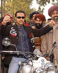 Bollywood actor Gulshan Grover participates in a vintage bike drive from Asiad Village to Tivoli Garden in New Delhi