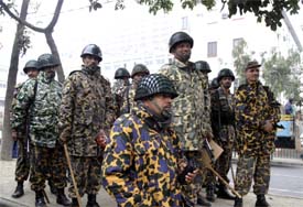 Paramilitary troops stand guard outside the Bangladesh secretariat building during a transport blockade in Dhaka on Sunday.  Reuters