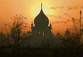 The majestic dome of the Sector 38-West gurdwara silhouetted against the Sun’s golden rays filtering through the sky in Chandigarh on Monday morning