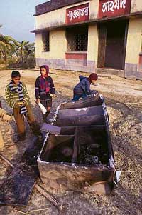 Burnt furniture of the CPM office which was set on fire by angry villagers at Nandigram on Monday. 