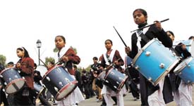 Schoolgirls participating in a rehearsal for the forthcoming Republic Day Parade, at Rajpath in the Capital
