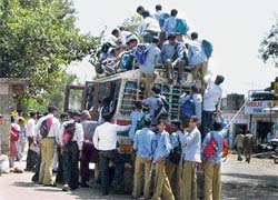 PROBLEM OF PLENTY: Overloaded buses are a common sight at Solan