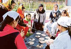 Langar being prepared by students of Guru Nanak Khalsa College for Women in connection with Gurpurb in Ludhiana