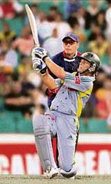 Australias Adam Gilchrist hits a six against England during their Twenty20 match in Sydney