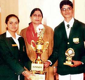 Yashika and Adhbhut Gupta of Green Land Senior Secondary School holds the trophy that they won in an inter school Hindi declamation competition at Sutlej Public Senior Secondary School, Rahon Road, Ludhiana