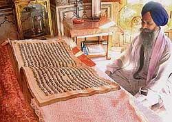 The ancient handwritten bir of Guru Granth Sahib at Har Ki Pouri in the Golden Temple has been replaced with a printed one. 