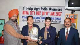 Mr P.S. Lamba (left), Chief Manager, Bank of Maharashtra, Ludhiana, gives away the prizes to the members of the winning team of the quiz contest held at Ryan International School, Ludhiana, on Wednesday