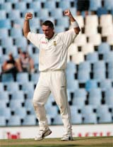 South Africas Andre Nel celebrates after Pakistans Yasir Hameed was caught out by Makhaya Ntini during their first Test at Cent