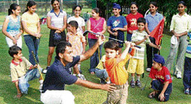 Little Jeevs tee off in the golf greens
