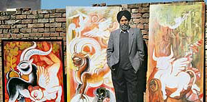 Satwant Singh amidst his paintings