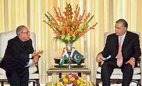 Foreign Minister Pranab Mukherjee gestures during talks with Pakistani Prime Minister Shaukat Aziz in Islamabad