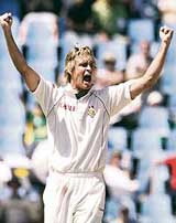 South Africas Paul Harris celebrates after dismissing Pakistans Kamran Akmal during the fourth day of the first Test in Centurion on Sunday