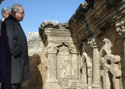 External Affairs Minister Pranab Mukherjee looks at stone carvings from the Sixth Century BC Ghandara Civilisation at Taxila, 30 km west of Islamabad, on Sunday.