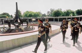 The Army chief, General J.J. Singh, accompanied by the Western Army Commander, Lieut-Gen Daljeet Singh (on his right and behind) and other officers, going around the War Memorial in Chandigarh
