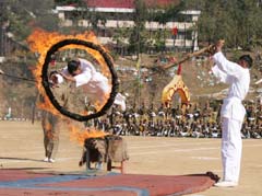Police recruits show their skills during the eighth passing-out parade at the Police Training College, Daroh, in Palampur