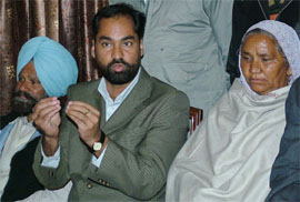 Mr Pawan Tinu, state president, Bhujan Karanti Party, flanked by brother and sister of the late Kanshi Ram, the founder of BSP, addresses a press conference in Jalandhar on Monday.