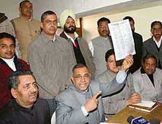 The president of the Punjab unit of the BJP, Mr Avinash Rai Khanna, at a party meeting in Chandigarh on Monday.