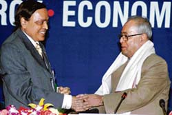 External Affairs Minister Pranab Mukherjee being welcomed by Petroleum Minister Murli Deora at the inauguration of PETROTECH-2007 in New Delhi on Tuesday. 