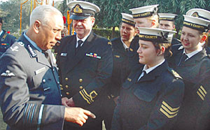 Air Chief Marshal S.P. Tyagi with foreign NCC cadets during a tea party in the Capital on Tuesday.