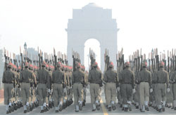 Delhi Police jawans march on Rajpath during the rehearsal for the Republic Day Parade in the Capital