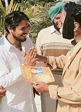 The Bharatiya Jan Shakti candidate from Kharar, Mr Anil Kumar, seeks votes in Mohali on Wednesday.
