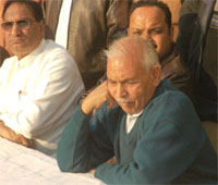 Mr Raj Kumar Gupta, who has been denied party candidate, in a dejected mood at a function in Jalandhar on Friday.