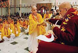 A devotee being offered "japa mala" as part of initiation by Gopal Krishna Goswami Bhagvadpadji Maharaj at Hare Krishna Dham, Sector 36-B, Chandigarh