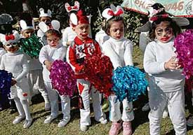 Tiny tots of Evergreen Academy perform during the Basant Panchami function in Sector 33, Chandigarh, on Sunday