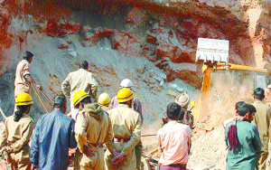 Fire service jawans removing the debris of a collapsed building at Vasant Vihar in the Capital on Sunday.