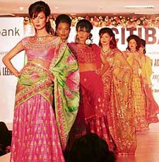Models sashay down the ramp to celebrate the fifth year of the setting up of a bank branch in Ludhiana on Saturday