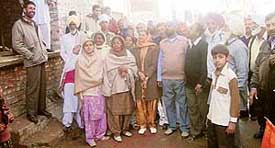 Ms Razia Sultan, Congress nominee, with her supporters at Ahmedgarh on Sunday