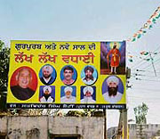 Bunting and a hording of the Congress tied to electric and telecom poles near the office of the District Electoral Officer in Jalandhar on Monday.