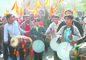NOMINATIONS BEGIN: Supporters of a candidate put up a 'musical show' as they march beating their drums near the district election office in Jalandhar on Tuesday. 