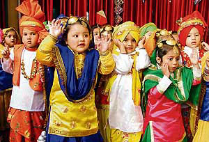 Tiny tots of Love Dale Montessori present a dance on the occasion of Basant Panchmi in Ludhiana on Tuesday.