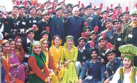 The Haryana Chief Minister, Mr Bhupinder Singh Hooda, and the NCC Director-General, Lt-Gen Prakash S. Chaudhary, with NCC cadets at the Republic Day Camp, in the Capital on Wednesday.