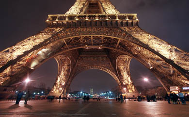 A file photo taken December 27, 2000, in Paris, shows the Eiffel Tower at night. The Eiffel Tower's lights will be turned off for five minutes on February 1 as part of a campaign to save energy and draw attention to the plight of the planet.