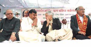 The Haryana Chief Minister, Mr Bhupinder Singh Hooda and the Delhi Chief Minister, Mrs Sheila Dikshit, at a function organised on the occasion of 'Pran- Pratistha of Panchdev Mandirs' at Sri Jairam Brahamcharya Ashram in the Capital on Wednesday.
