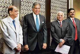 Ratan Tata, Chairman of Tata Steel, N.A. Soonawala, Vice-Chairman, Tata Sons, B.Muthuraman and Kaushik Chatterjee of Tata Steel at a press conference to announce acquisition of Corus in Mumbai on Wednesday