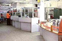 A bank wears a deserted look as a large number of its employees , put on poll duty, go for rehearsals