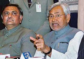 The Bihar Chief Minister, Mr Nitish Kumar, makes a point in Jalandhar on Thursday as the BJP candidate from Jalandhar Central, Mr Manoranjan Kalia, looks on